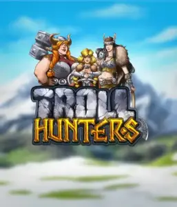 Изображение игрового автомата "Troll Hunters" от Play'N Go, где изображены три воина-викинга: две женщины и один мужчина, облаченные в традиционные броню викингов. За их спинами виднеются горные вершины, что добавляет атмосферу северных легенд. Этот игровой автомат идеален для поклонников скандинавской культуры и поисков приключений.